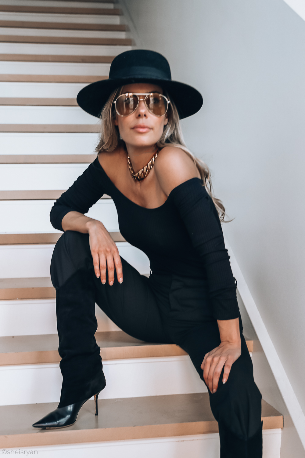 women's designer shades on ryan starr with black hat 