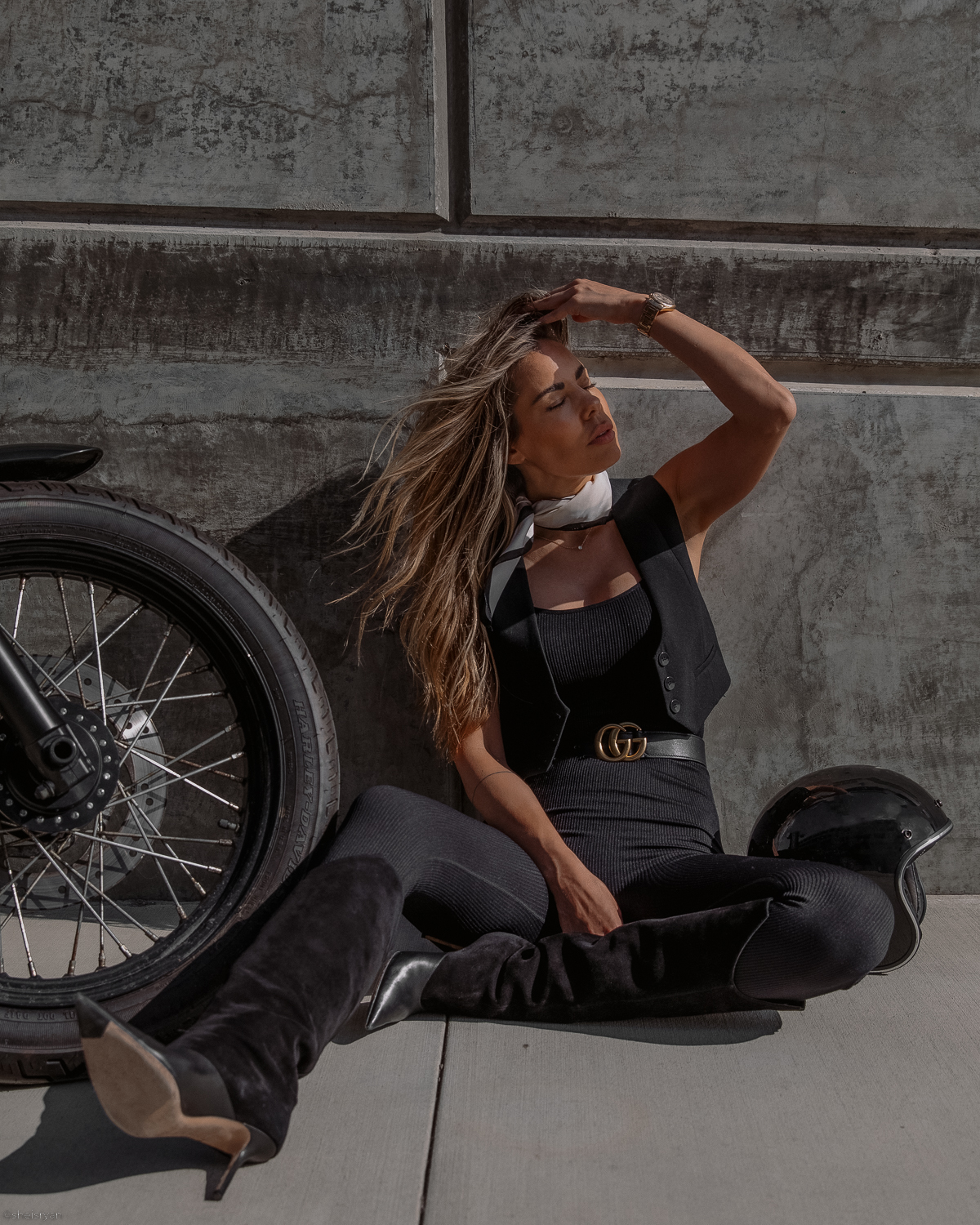 girl with helmet at motorcycle 