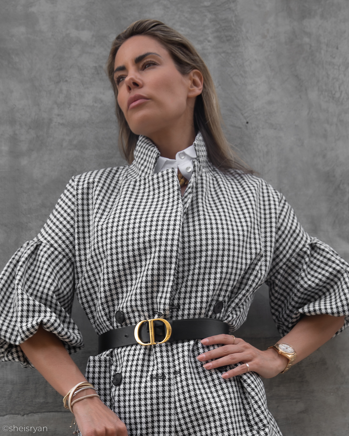 women in trending houndstooth pieces with puff sleeves
